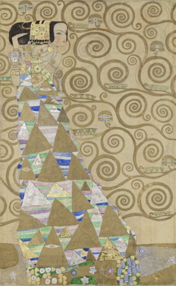 Das Gemälde „Erwartung“ von Gustav Klimt zeigt eine Frau in einem geometrischen Gewand vor einem spiralförmigen Hintergrund.