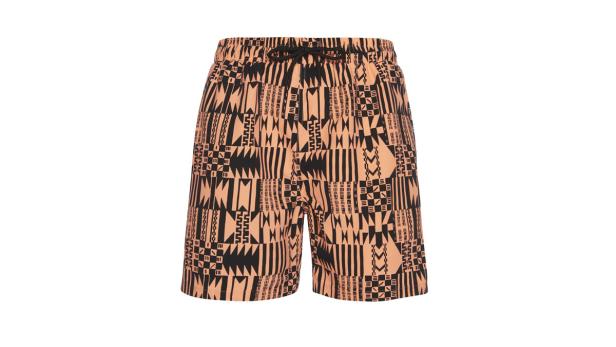 Eine kurze Hose mit einem geometrischen Muster in Schwarz und Pfirsichfarben.