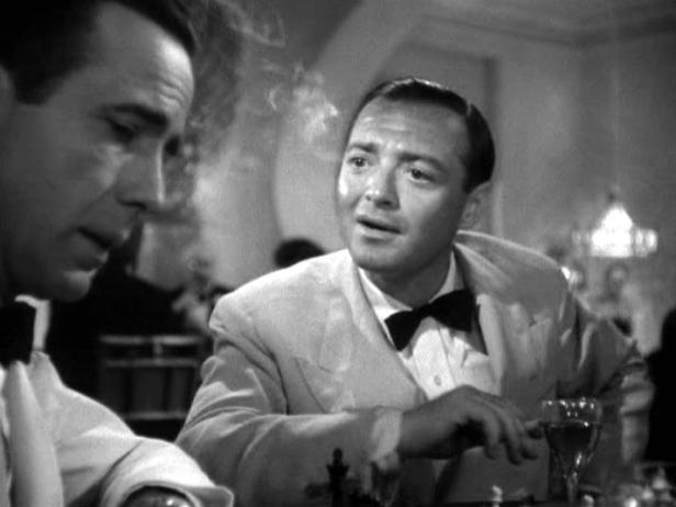 Humphrey Bogart und Gene Kelly in einer Szene aus einem Film Noir.