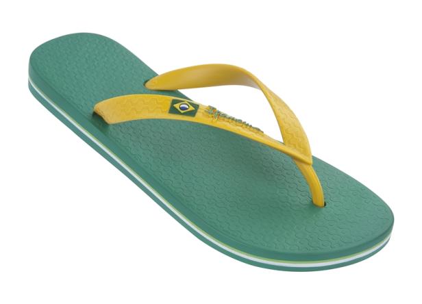 Ein grüner Zehentrenner mit gelben Riemen und der brasilianischen Flagge.