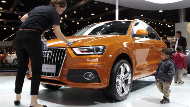 REUTERSAn employee cleans the Audi Q3 2.0 T Quattro at the Qatar International Motor Show in Doha, January 27, 2012. REUTERS/Fadi Al-Assaad (QATAR - Tags: TRANSPORT BUSINESS) REUTERSAn employee cleans the Audi Q3 2.0 T Quattro at the Qatar International Motor Show in Doha, January 27, 2012. REUTERS/Fadi Al-Assaad (QATAR - Tags: TRANSPORT BUSINESS)
