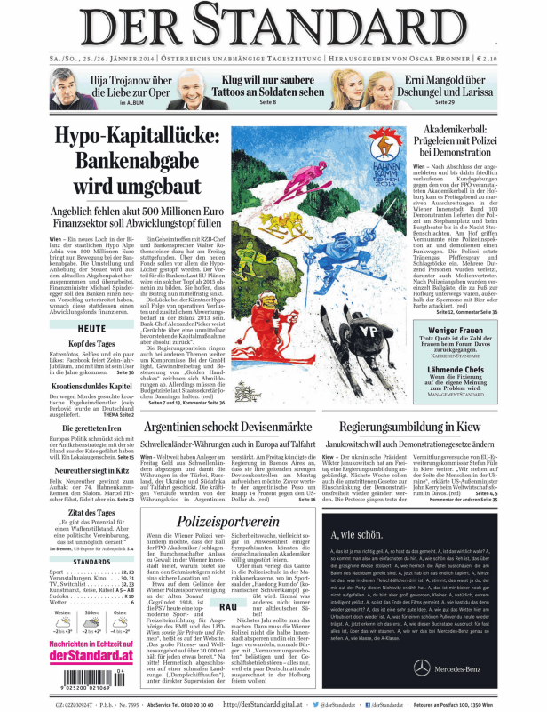 Karikatur in einer Zeitung zeigt Skifahrer vor dem Hintergrund des Hahnenkamm-Rennens 2014.