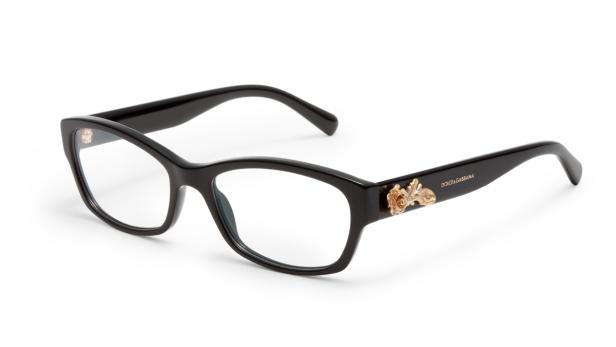Eine schwarze Brille von Dolce & Gabbana mit goldenen Rosenverzierungen.