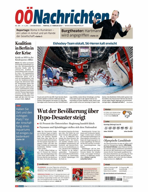 Ein Eishockeyspieler in roter Spielkleidung erzielt ein Tor bei den Olympischen Winterspielen in Sotschi.