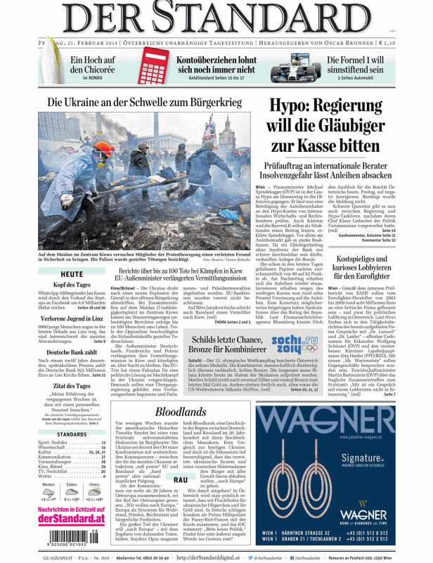 Demonstranten versuchen, einen Verletzten auf dem Maidan-Platz in Kiew in Sicherheit zu bringen.