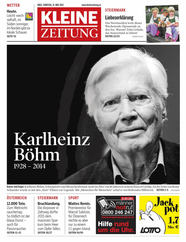 Schwarz-Weiß-Porträt des Schauspielers Karlheinz Böhm auf einer Zeitung Titelseite.