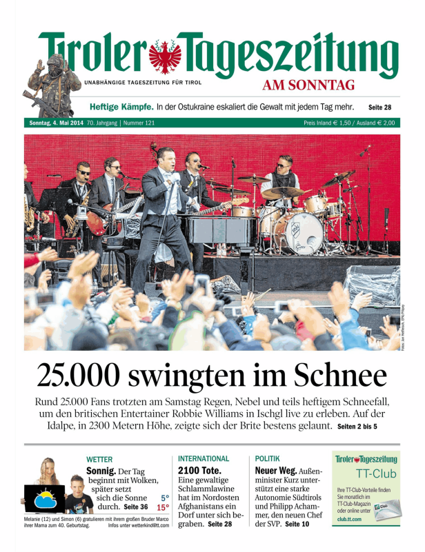 Titelseite der Tiroler Tageszeitung mit einem Foto von Robbie Williams auf der Bühne.