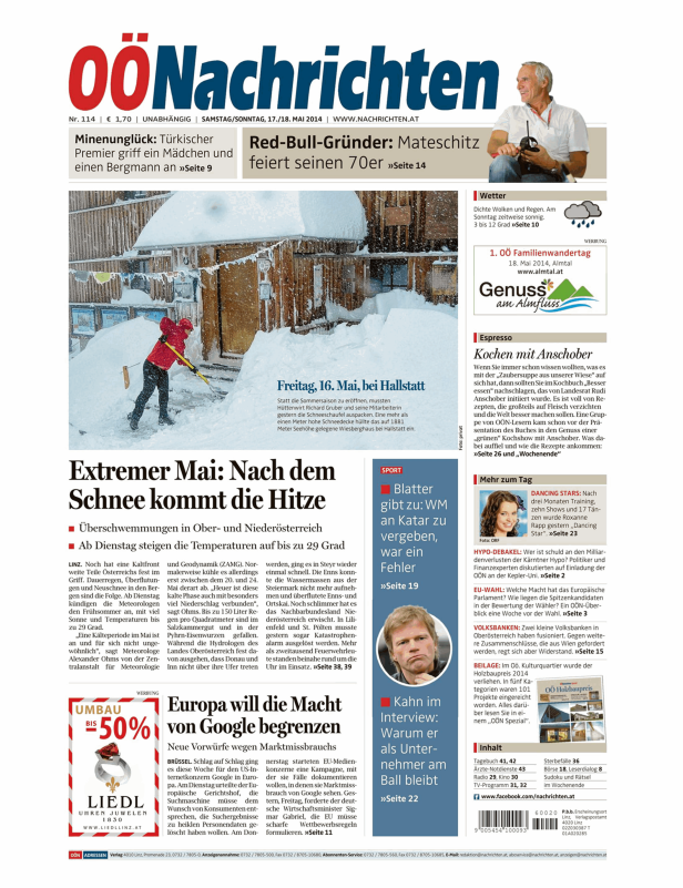 Ein Mann schaufelt Schnee vor dem Wiesberghaus bei Hallstatt im Mai.