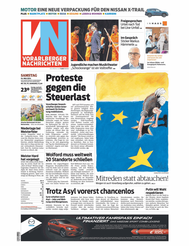 Karikatur in einer Zeitung zeigt einen Vogel, der auf einer EU-Flagge steht.