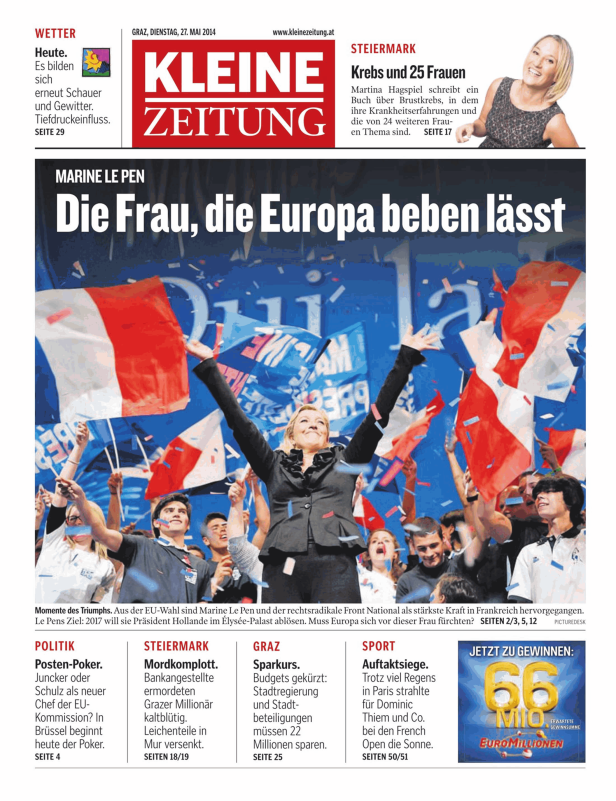 Marine Le Pen feiert mit Anhängern und französischen Flaggen.