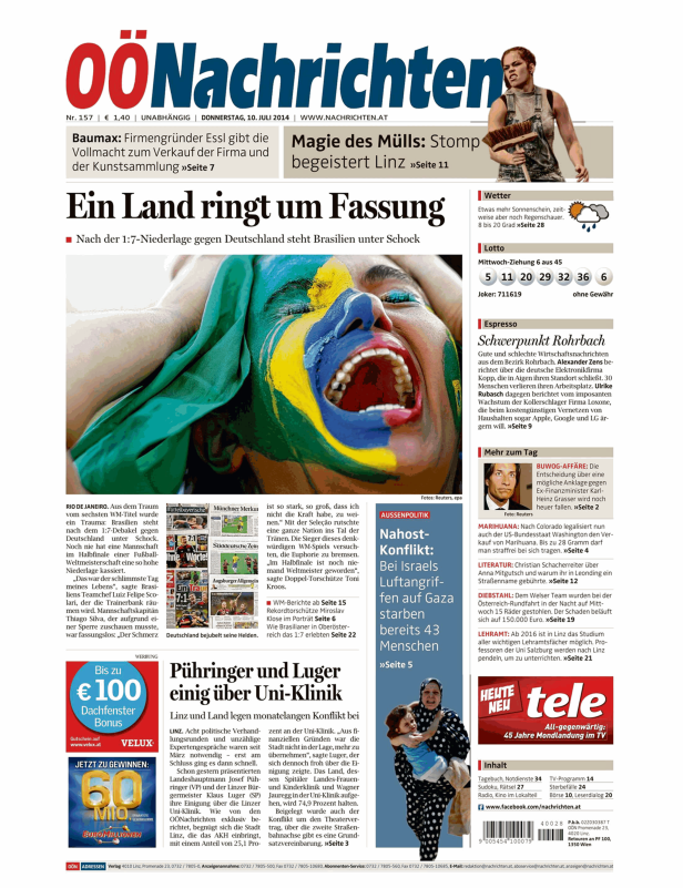 Eine weinende Frau mit brasilianischer Flaggenfarbe im Gesicht.