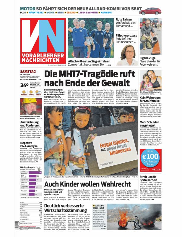 Malaysische Kinder fordern bei einer Trauerfeier in Petaling Jaya „Vergesst die Verletzungen, aber vergesst niemals Güte – betet für MH17“.