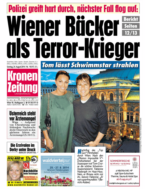 Tom Cruise und Fabienne Nadarajah posieren vor der Wiener Staatsoper.