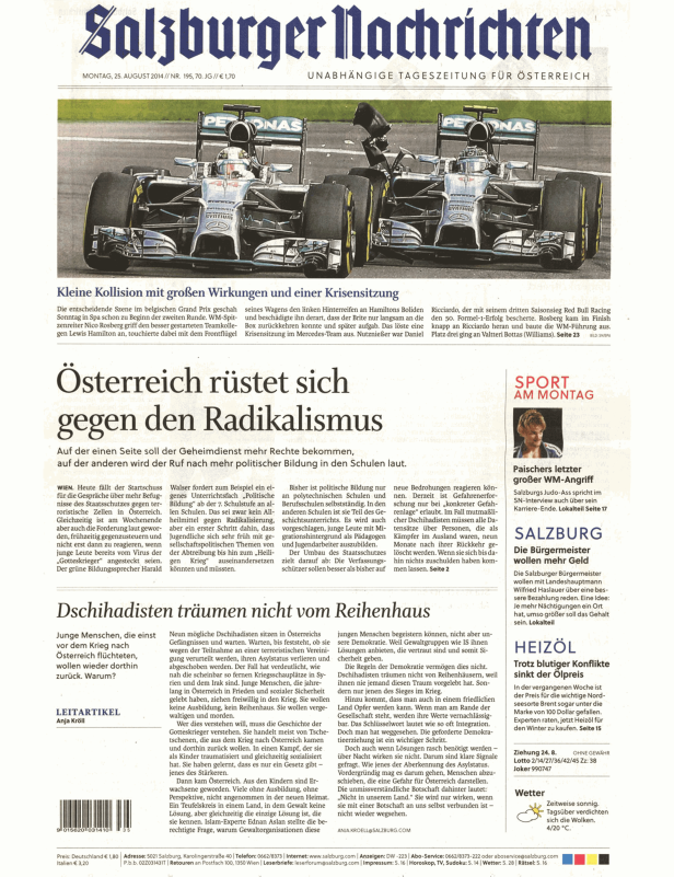Zwei Formel-1-Wagen auf einer Rennstrecke, aufgenommen für die Titelseite der Salzburger Nachrichten.