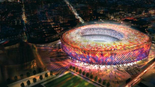 Das beleuchtete Stadion Camp Nou in Barcelona bei Nacht.