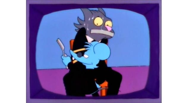 Itchy fesselt und bedroht Scratchy mit einem Rasiermesser in einer Szene aus „The Simpsons“.