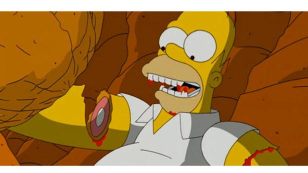 Homer Simpson als Vampir mit Blut an den Zähnen und einer abgebissenen Hand.