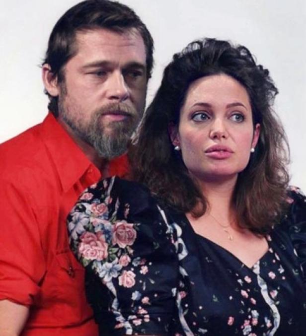 Brad Pitt und Angelina Jolie posieren für ein gemeinsames Foto.