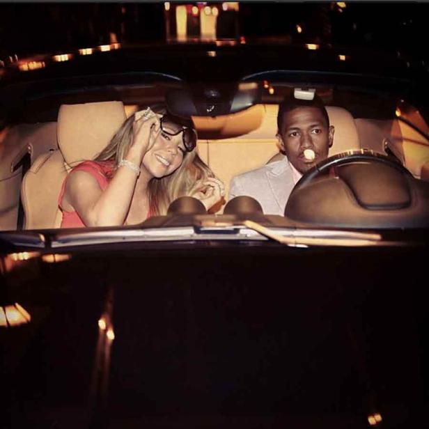 Mariah Carey und Nick Cannon sitzen in einem Auto.