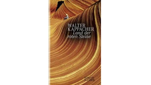 Das Cover des Buches „Land der roten Steine“ von Walter Kappacher zeigt eine Person in einer Felslandschaft.