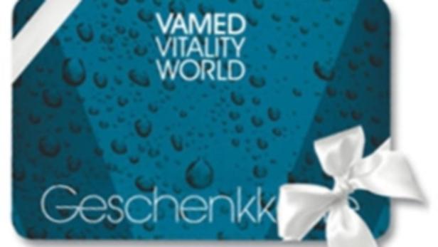 Geschenkkarten für die Therme in jeder Preislage Eine Geschenkkarte von Vamed Vitality World mit einer weißen Schleife.