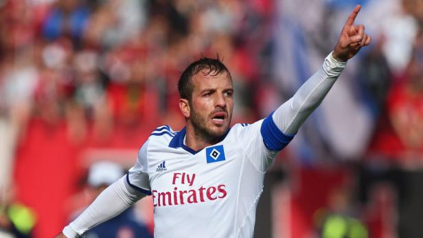 Ein Fußballspieler des Hamburger SV jubelt mit erhobenem Zeigefinger.