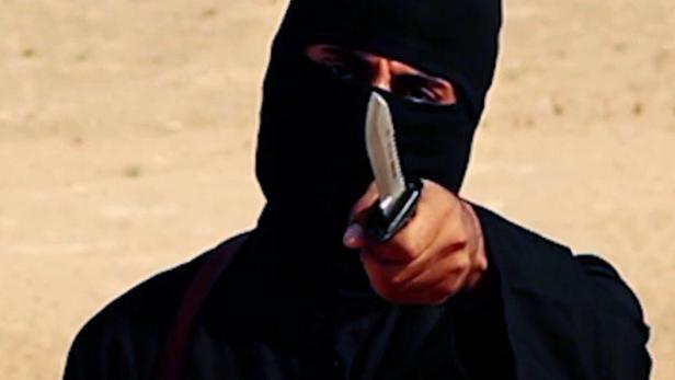 Eine Person mit Sturmhaube hält ein Messer in der Hand.