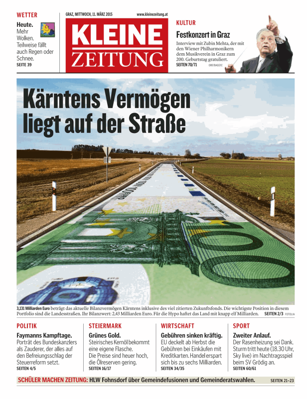 Eine Straße ist mit einem Muster aus Euroscheinen bemalt.