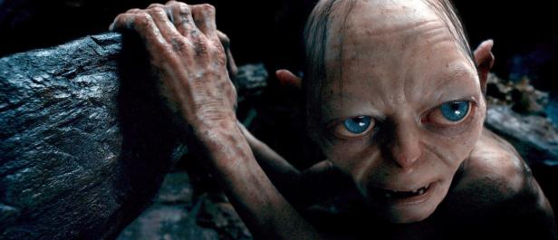 Nahaufnahme von Gollum, einer Figur aus „Der Herr der Ringe“, mit großen blauen Augen.