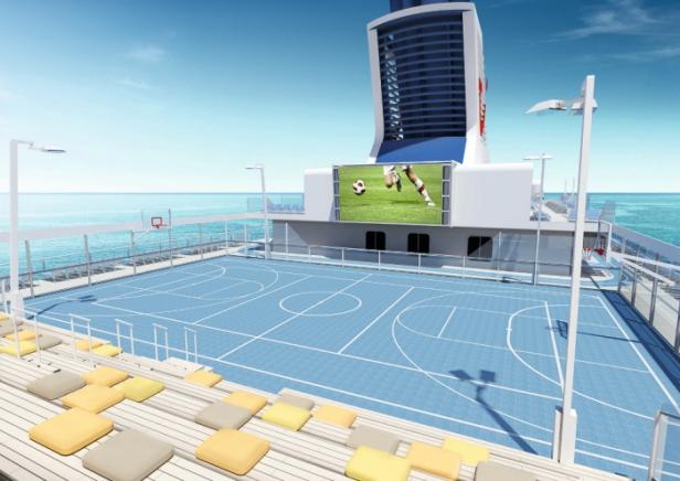 Ein Sportplatz mit Basketballkörben und einem Bildschirm auf einem Kreuzfahrtschiff.