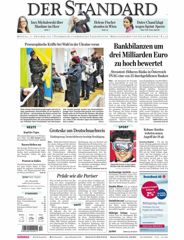 Eine Zeitung mit Artikeln über Politik, Wirtschaft und Sport liegt aus.