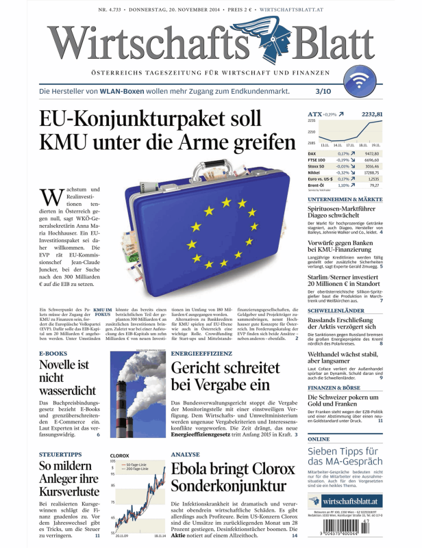 Ein blauer Koffer mit dem EU-Logo und Euro-Banknoten liegt auf einer Zeitung.