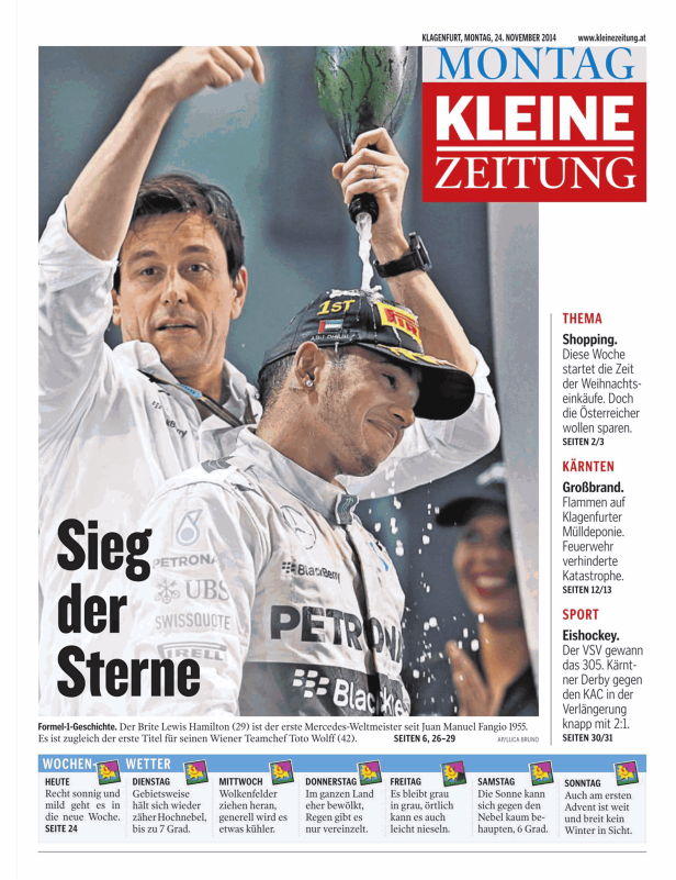 Lewis Hamilton und Toto Wolff feiern den Formel-1-Weltmeistertitel mit Champagner.