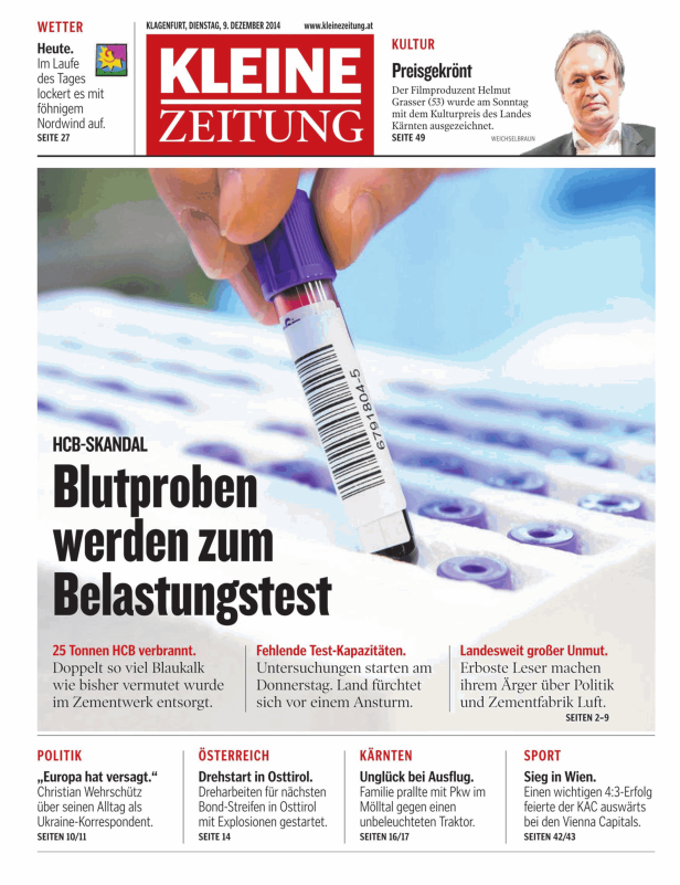 Ein Reagenzglas mit einer Blutprobe vor dem Hintergrund eines Zeitungsartikels zum Thema HCB-Skandal.