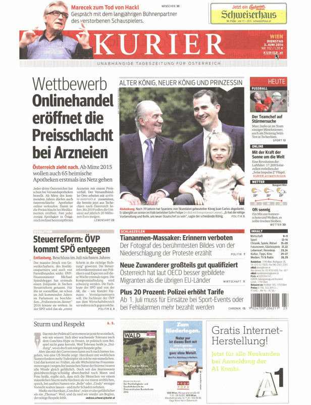 Der ehemalige König Juan Carlos von Spanien mit seinem Sohn Felipe und Enkelin Leonor auf einem Zeitungsfoto.