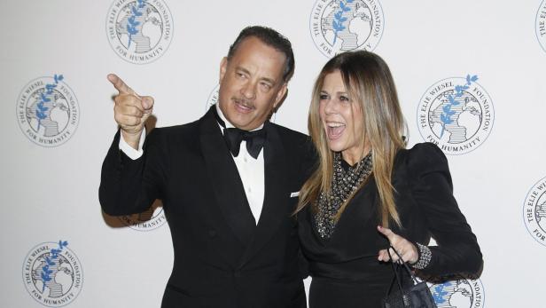 Actor Hanks and his wife Wilson arrive for the Eli