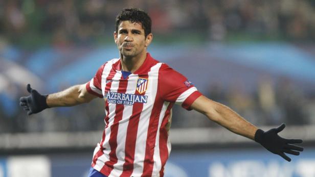 Diego Costa im Trikot von Atlético Madrid mit ausgestreckten Armen.