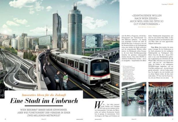 Eine Wiener U-Bahn fährt vor der Skyline der Stadt.