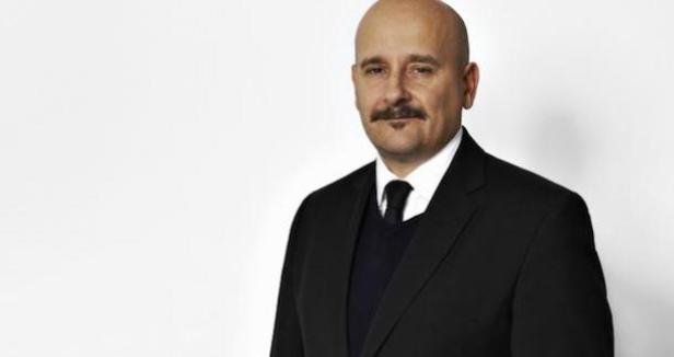 Michi Frank, CEO der Goldbach Group ab 1. Jänner 2014. (c: goldbach) Ein Mann mit Schnurrbart trägt einen schwarzen Anzug.