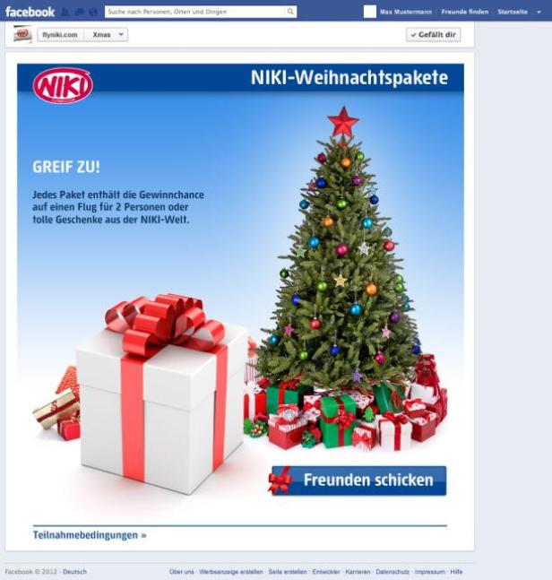 Ein Weihnachtsbaum und ein großes Geschenkpaket werben für NIKI-Weihnachtspakete.