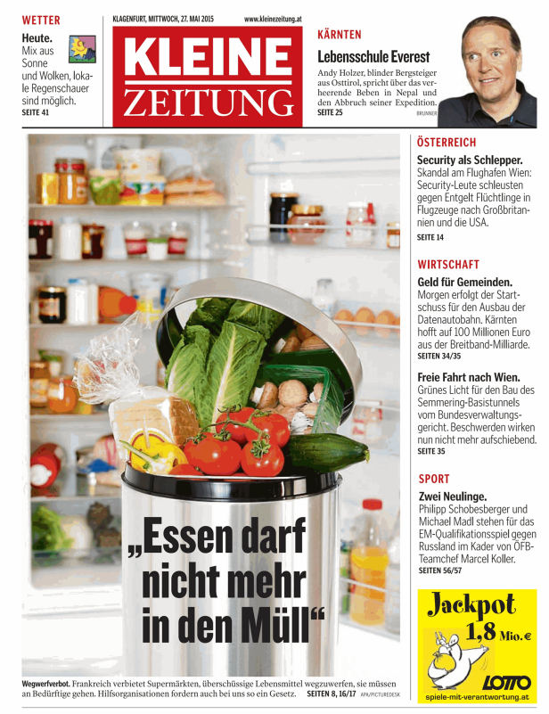 Ein voller Mülleimer mit Lebensmitteln, darüber der Slogan „Essen darf nicht mehr in den Müll“.