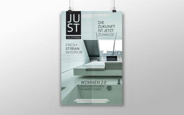 Ein Poster wirbt für „Just Living“ mit frischem, steirischem Interieur und intelligenten Häusern.