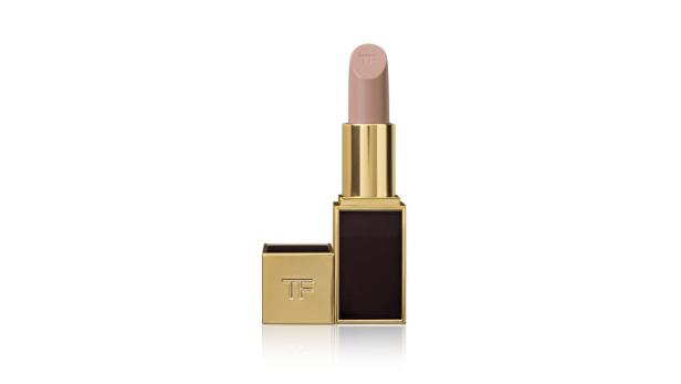 Ein geöffneter Tom Ford Lippenstift mit hellbeiger Farbe und goldener Hülle.