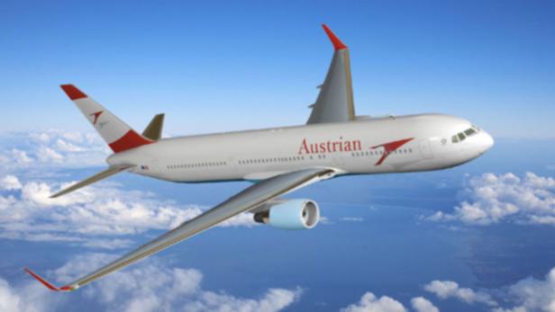 Ein Flugzeug der Austrian Airlines fliegt über den Wolken.