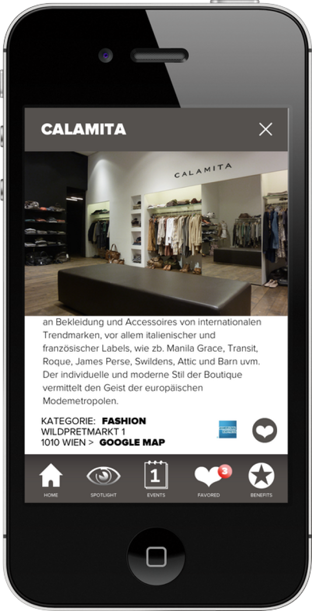 Ein iPhone zeigt die Inneneinrichtung der Boutique „Calamita“ in Wien.