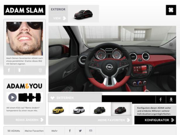 Das Interieur eines Opel Adam mit rotem Lenkrad und Armaturenbrett.