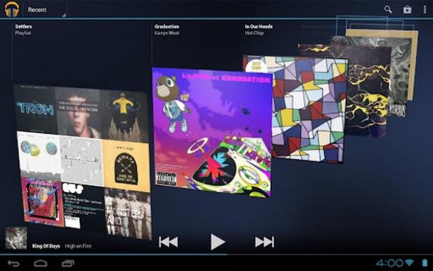 Ein Musik-Player-Interface zeigt verschiedene Albumcover, darunter „Graduation“ von Kanye West.