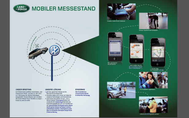 Ein Werbeplakat für einen mobilen Messestand von Land Rover und Volkswagen.
