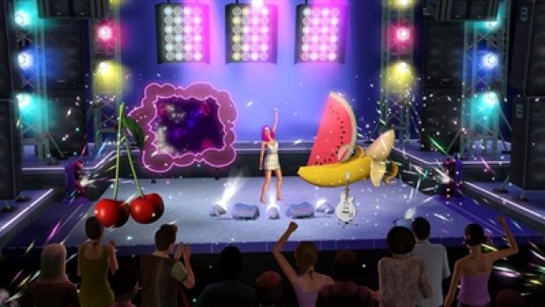 Die Sims 3 Showtime Katy Perry Collectors Edition (c: electronic arts) Eine Sängerin steht auf einer Bühne mit Requisiten und Lichtern vor einem Publikum.