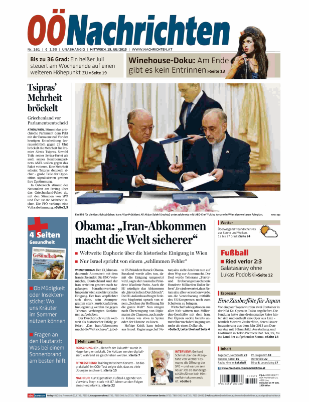 Ali Akbar Salehi und Yukiya Amano unterzeichnen das Atomabkommen in Wien.